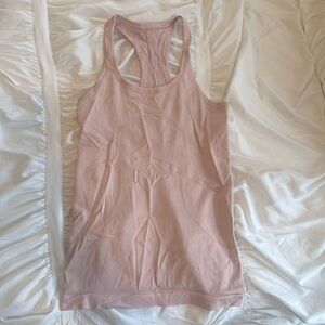Lululemon pink racerback tank size 4 color light pink